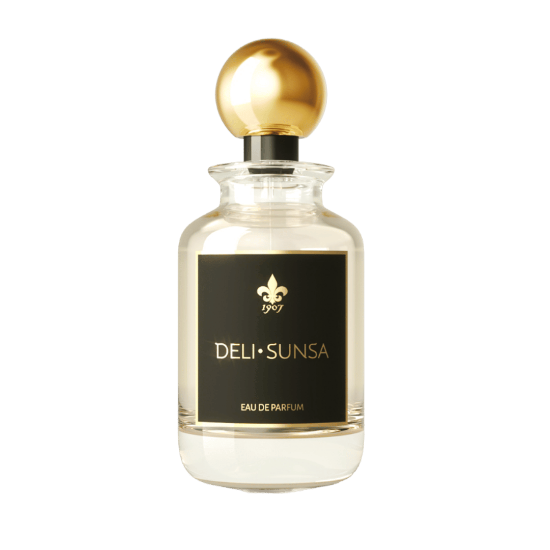Perfume bottle with gold cap and black label on a green background
