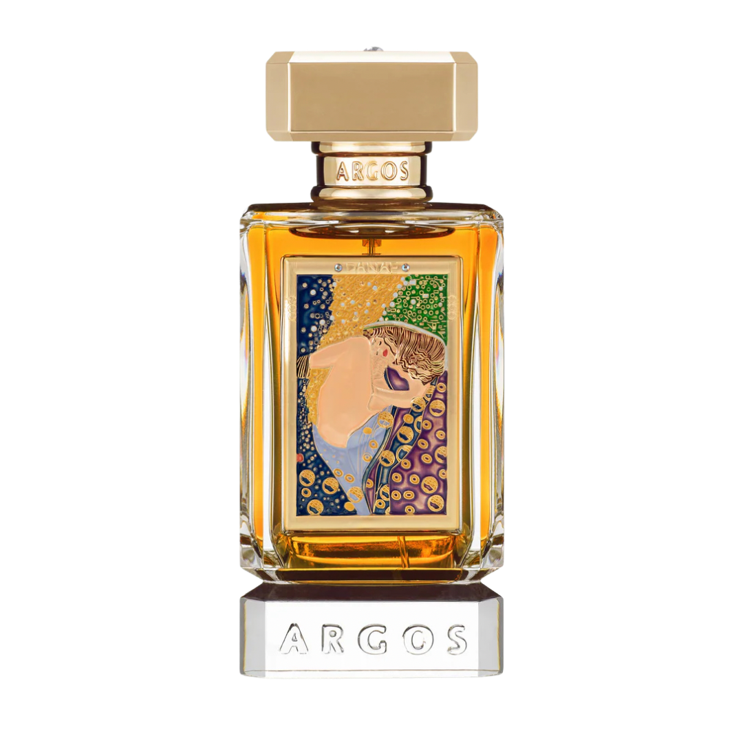 Argos perfume bottle with a gold-toned cap and base, featuring a colorful Art Nouveau style illustration on the front. The bottle is filled with amber-colored liquid and is set against a plain white background.