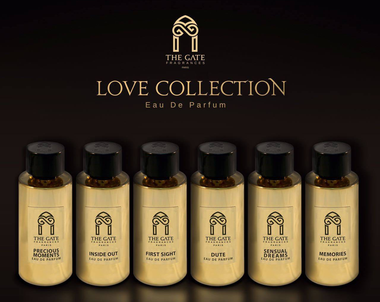 Collection of 'The Gate Paris' perfume bottles with labels on a dark background