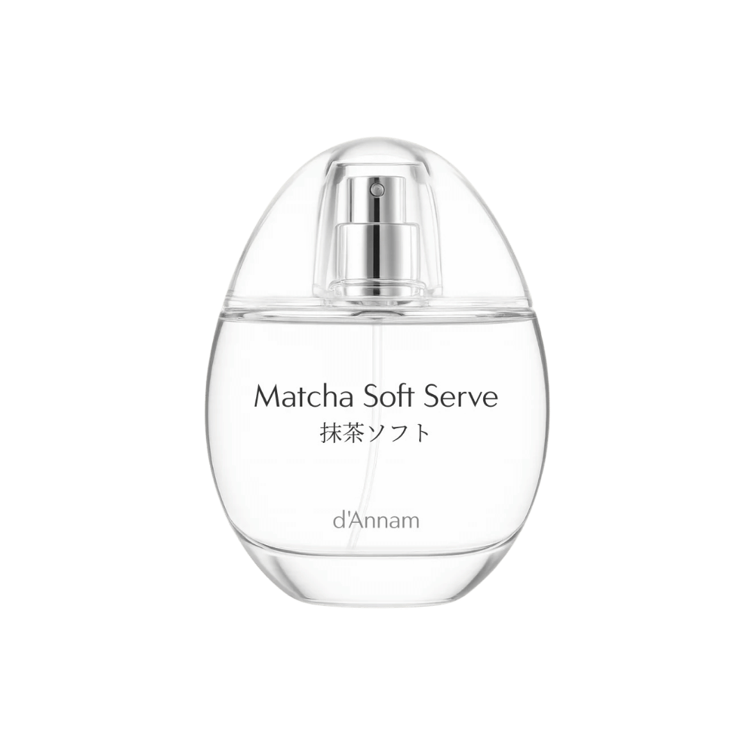 Clear perfume bottle labeled 'Matcha Soft Serve' by d'Annam on a green background