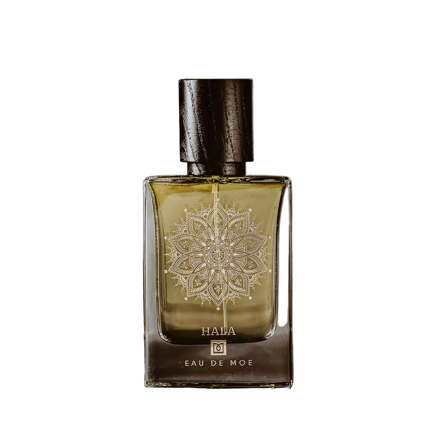 Perfume bottle with decorative label on a white background