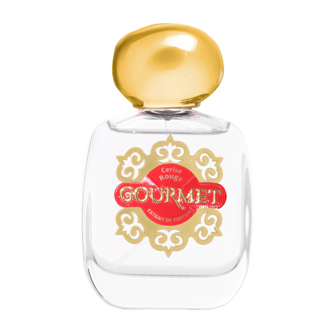 Perfume bottle with gold cap and decorative label on a white background