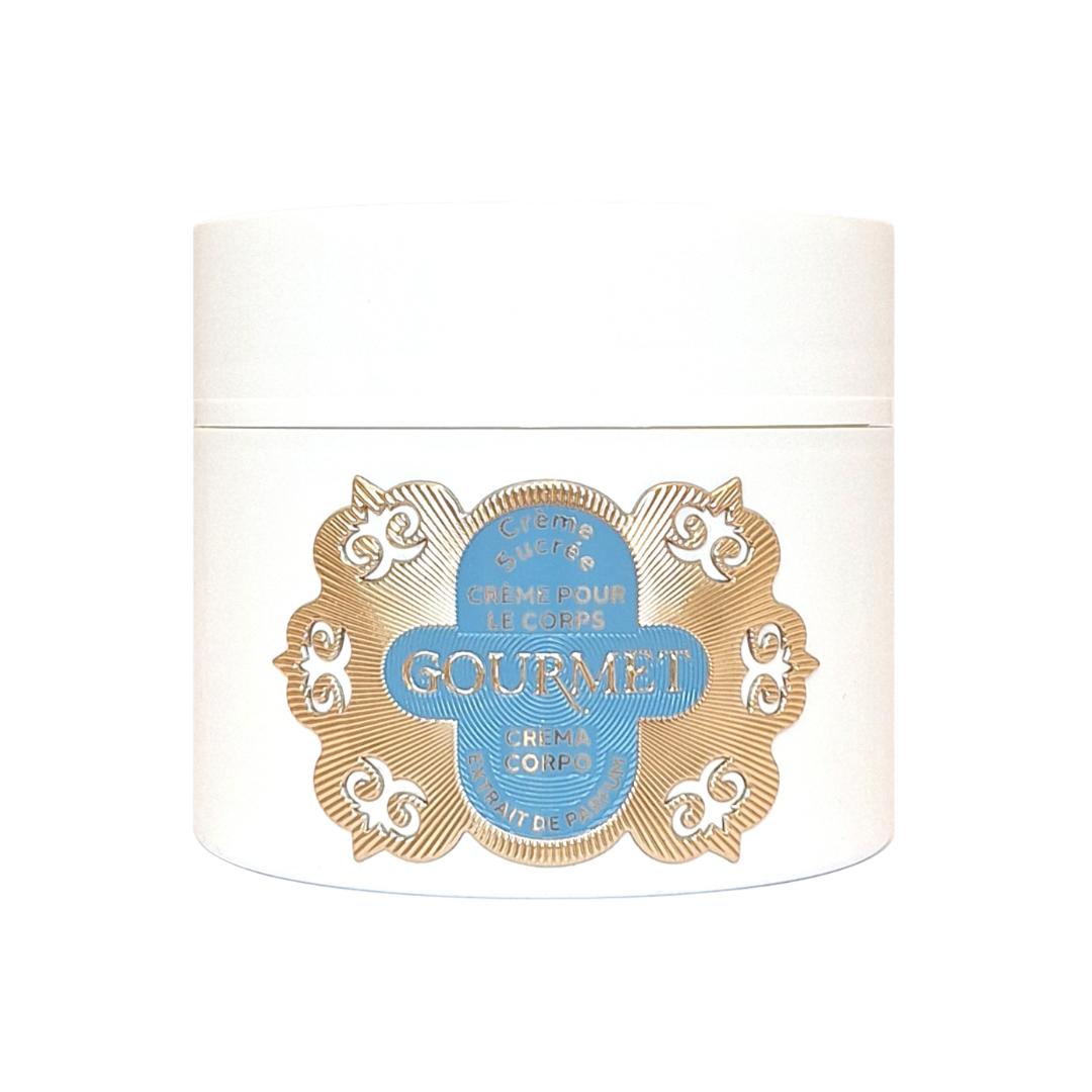 White jar with gold and blue decorative label on a white background