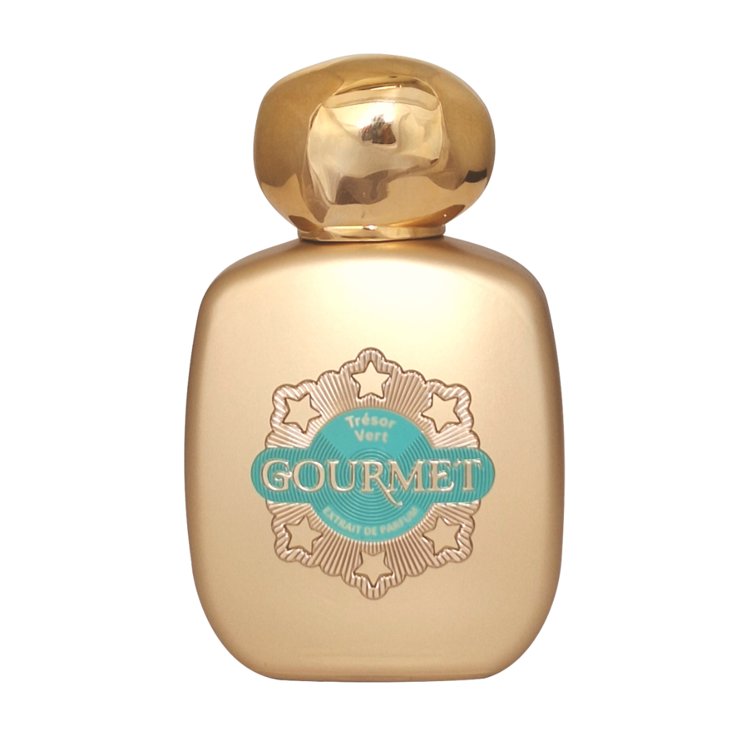 Gold perfume bottle with 'Gourmet' label on a white background