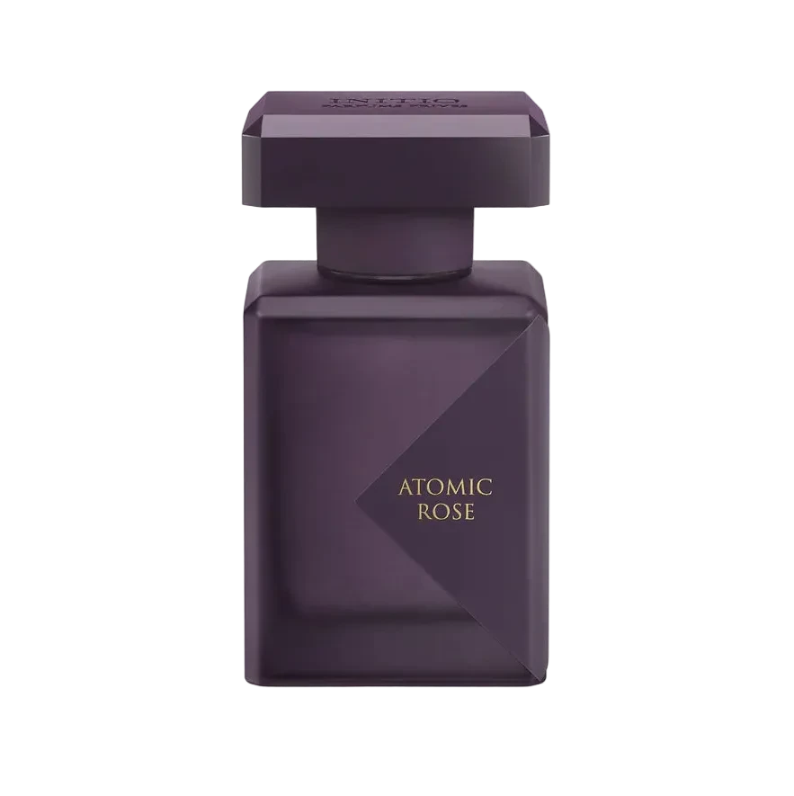 Purple perfume bottle labeled 'Atomic Rose' on a white background