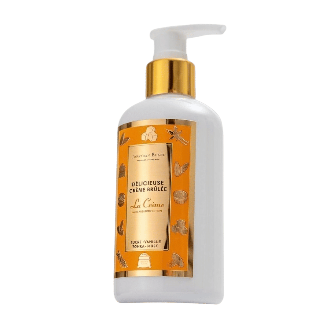 Bottle of 'Delicieuse Creme Brulee' with gold pump on a green background