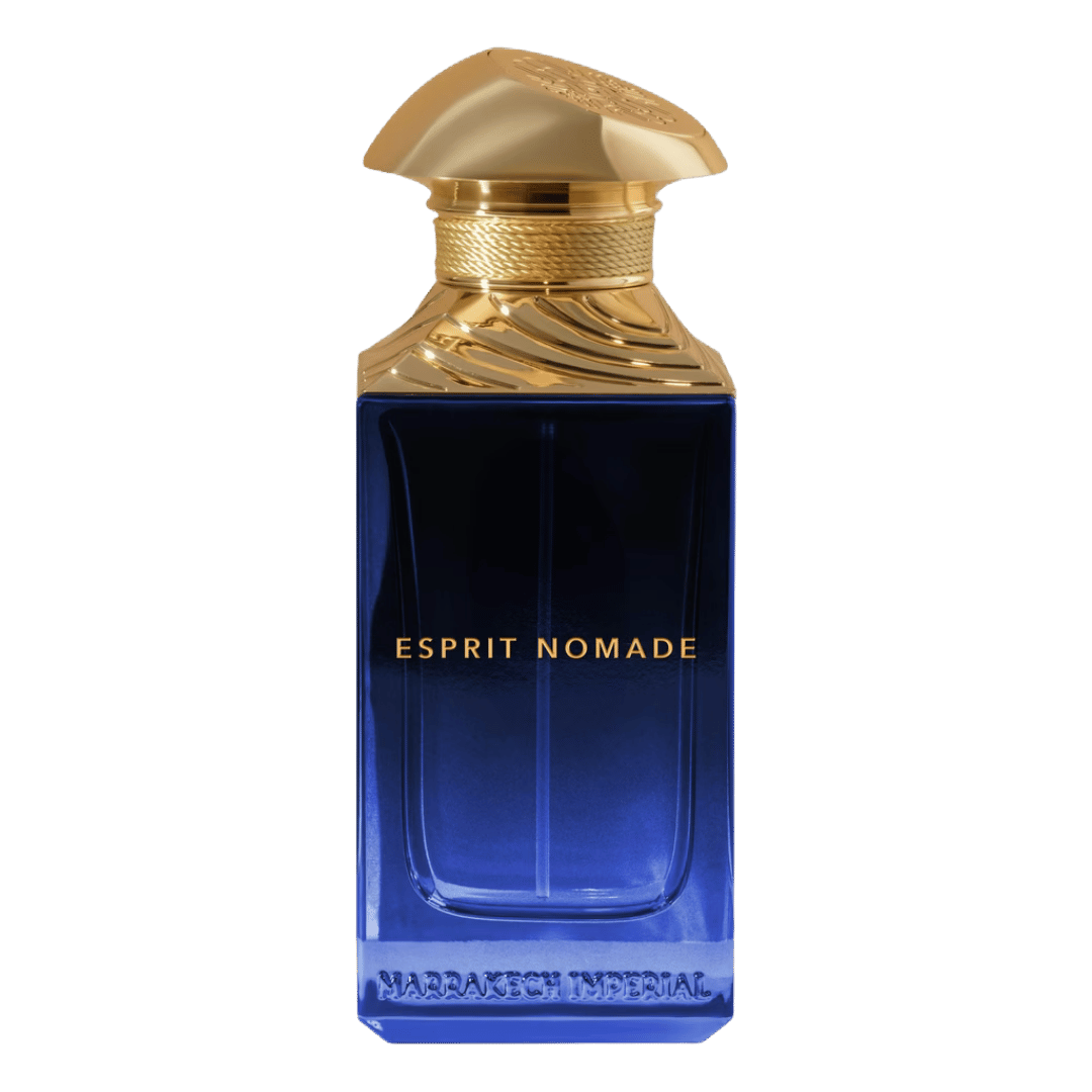 Blue perfume bottle with gold cap labeled 'Esprit Nomade' on a clear background