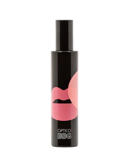 Black cosmetic bottle with pink design on a white background