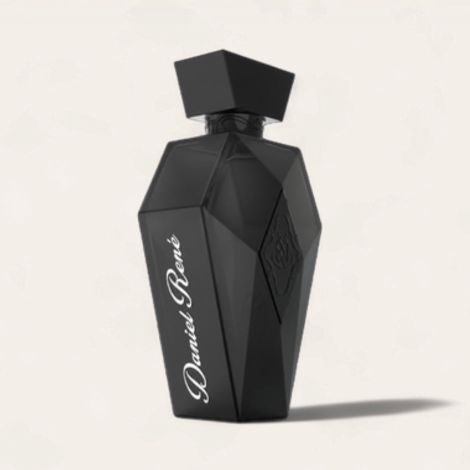 Black perfume bottle with geometric design on a light gray background