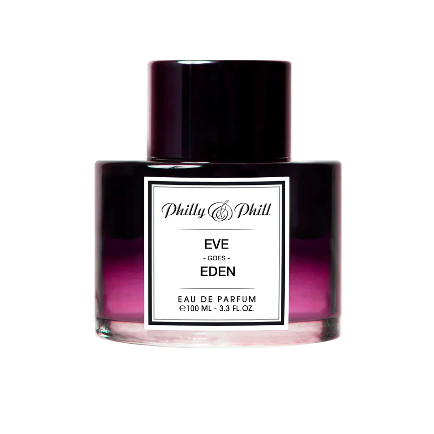 A bottle of Philly & Phill 'Eve goes Eden' Eau de Parfum with a dark cap and a label that has the product name and the scent description.