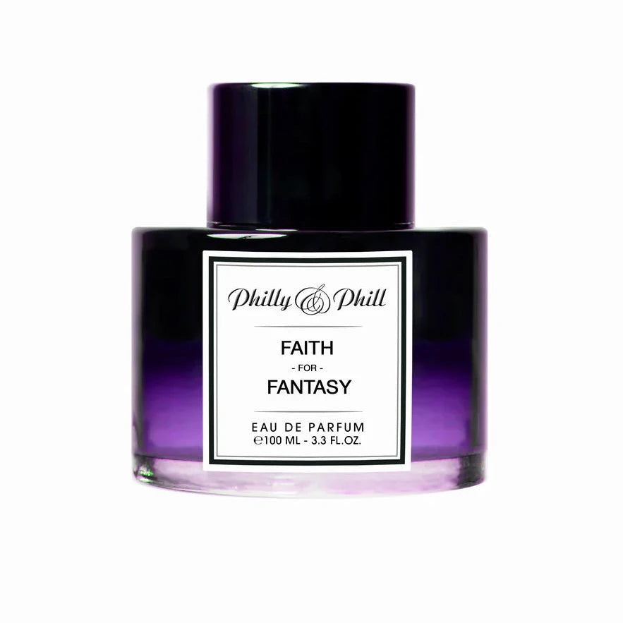 A bottle of Philly & Phill 'Faith for Fantasy' Eau de Parfum with a purple label and cap, against a white background.