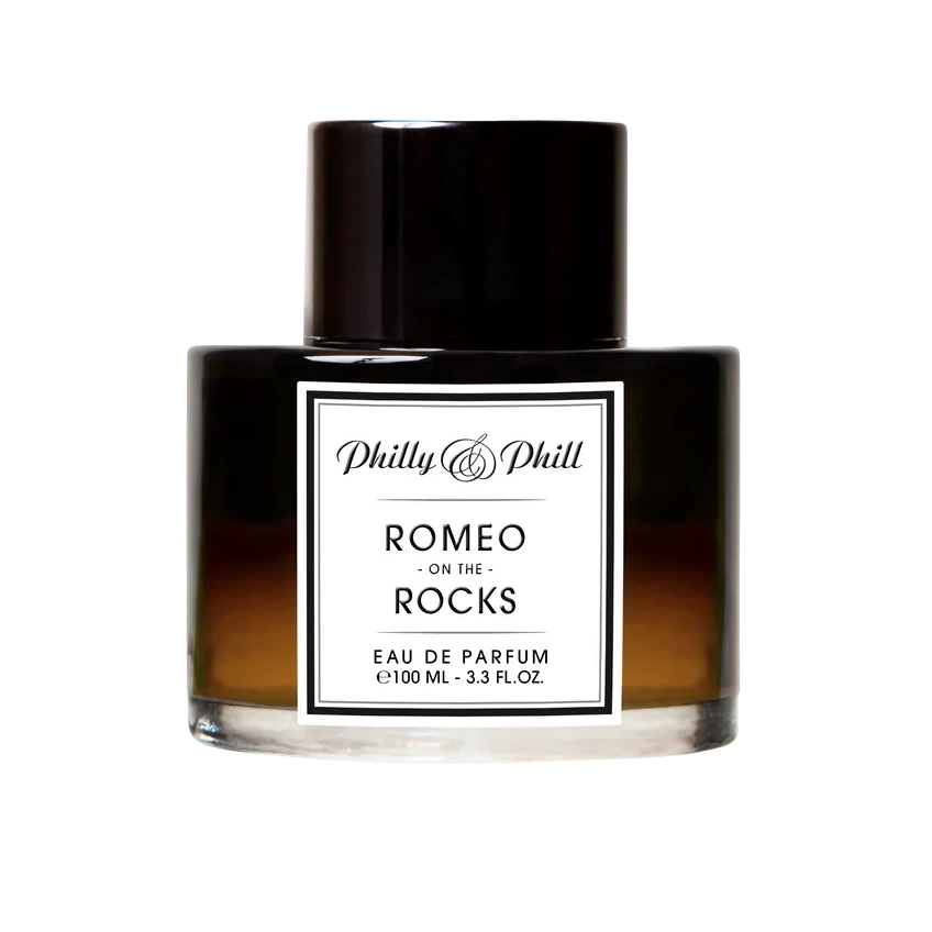 Perfume bottle labeled 'Romeo on the Rocks' by Philly & Phill on a white background