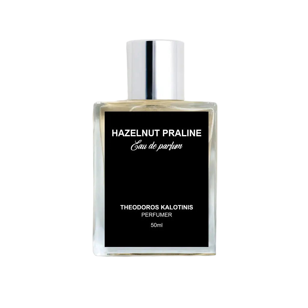 Perfume bottle labeled 'Hazelnut Praline' by Theodoros Kalotinis on a white background