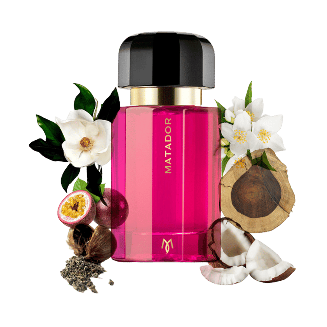 Pink perfume bottle with 'MATADOR' branding surrounded by flowers and natural elements on a transparent background