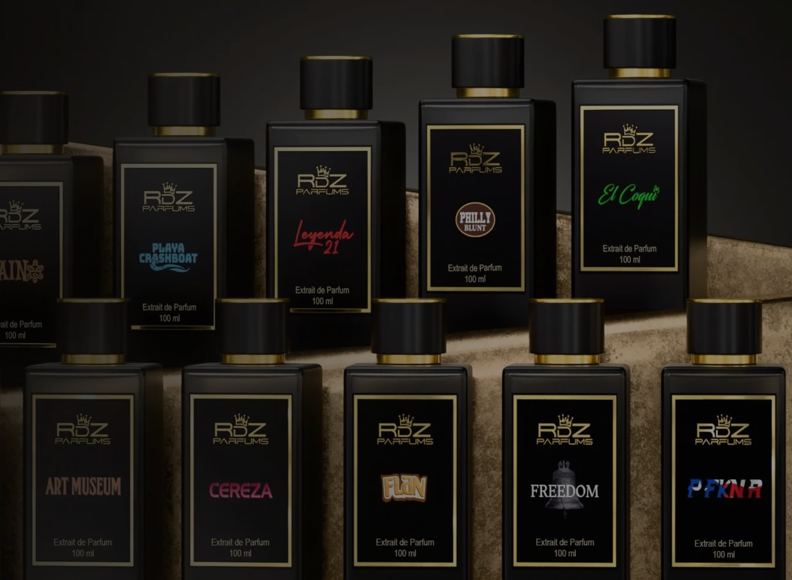 Collection of RDZ perfume bottles on a dark background