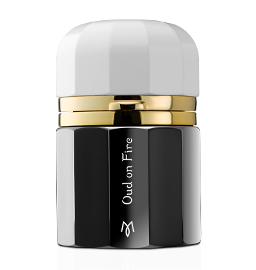 A black and gold perfume bottle labeled 'Ramon Monegal Oud On Fire' with a white cap.