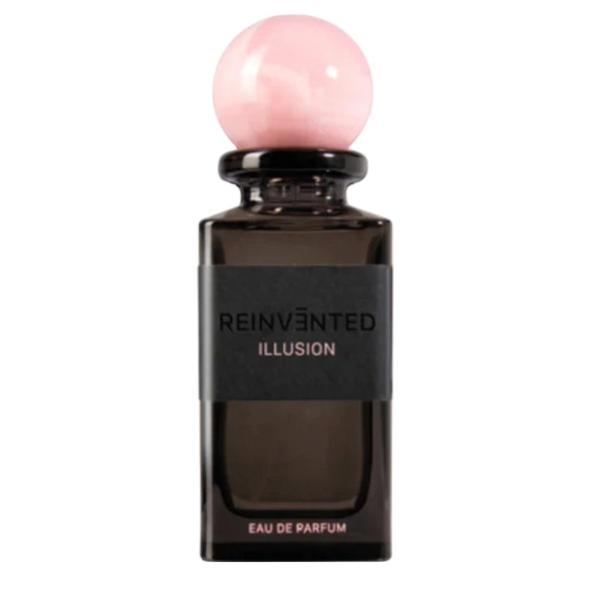 A bottle of Reinvented Illusion Eau de Parfum with a distinctive pink stopper on a dark background.