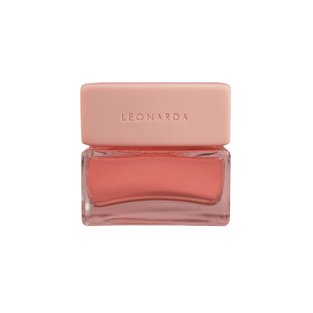 Pink Perfume bottle 'LEONARDA' branding on a green background