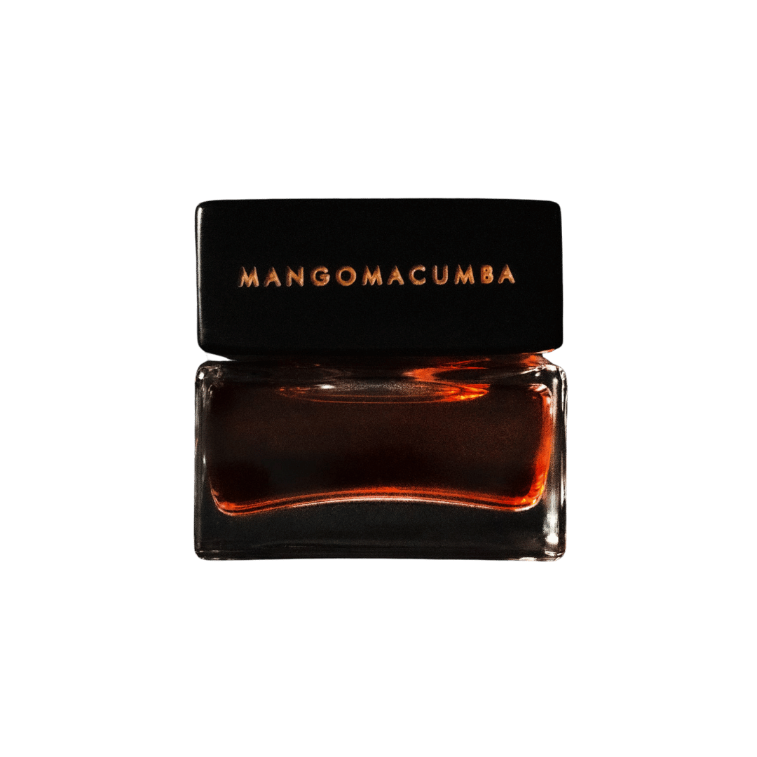 Mangomacumba perfume bottle with black cap on a transparent background
