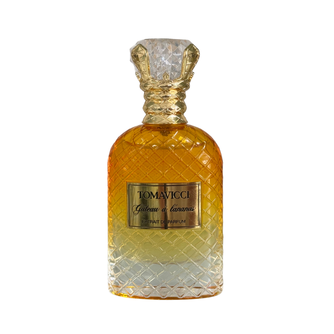 Tomavicci perfume bottle with textured design and gold cap on a white background