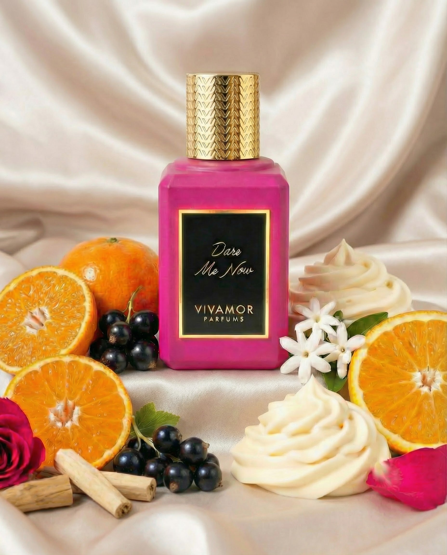 Vivamor perfume bottle with fruits, flowers, and cream on a soft background