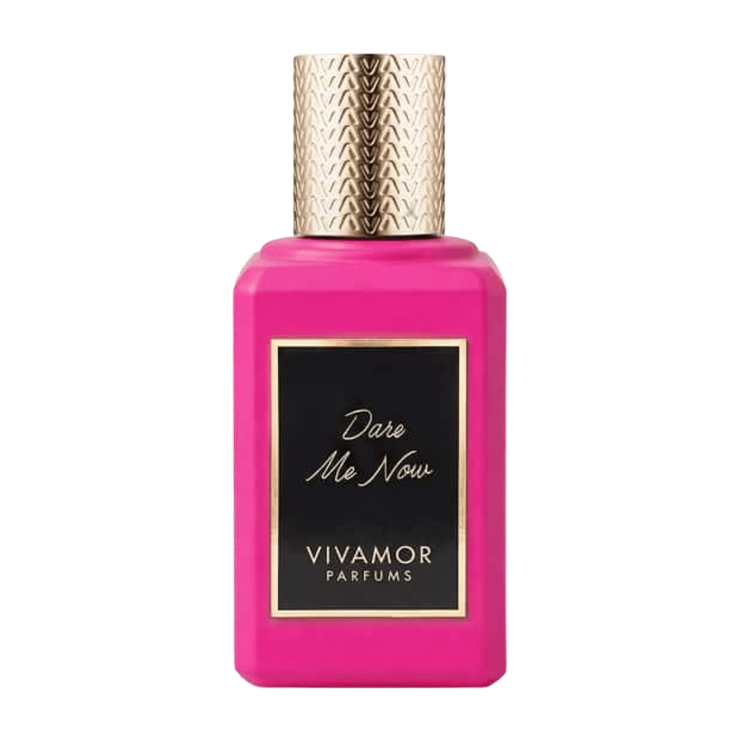 Pink perfume bottle with gold cap labeled 'Dare Me Now' by Vivamor Parfums on a green background