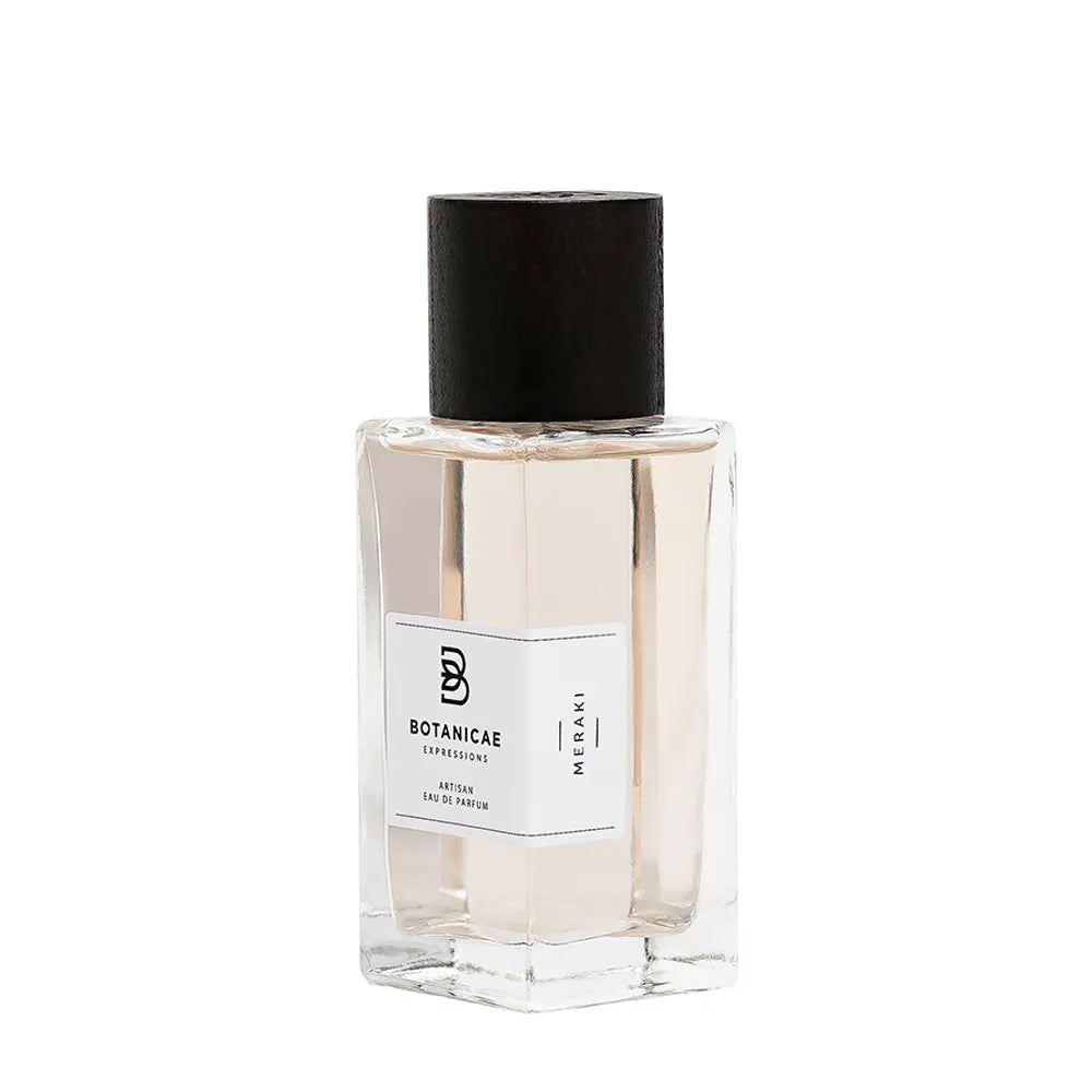 Perfume bottle with a black cap on a white background. botanicae-meraki-fig-perfume