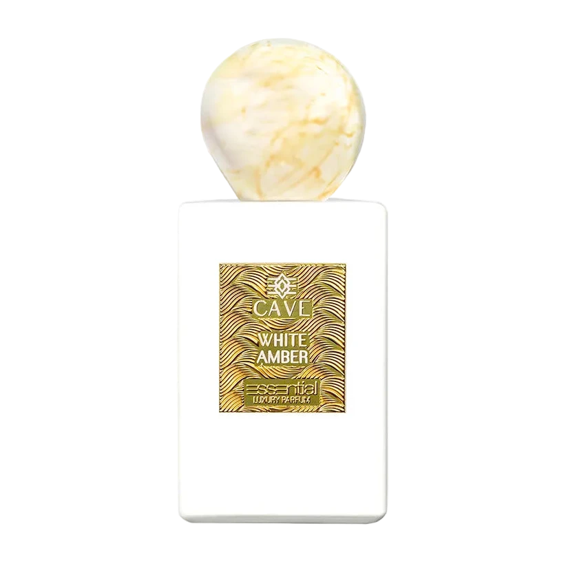 Perfume bottle labeled 'White Amber' by cave essential on a white background